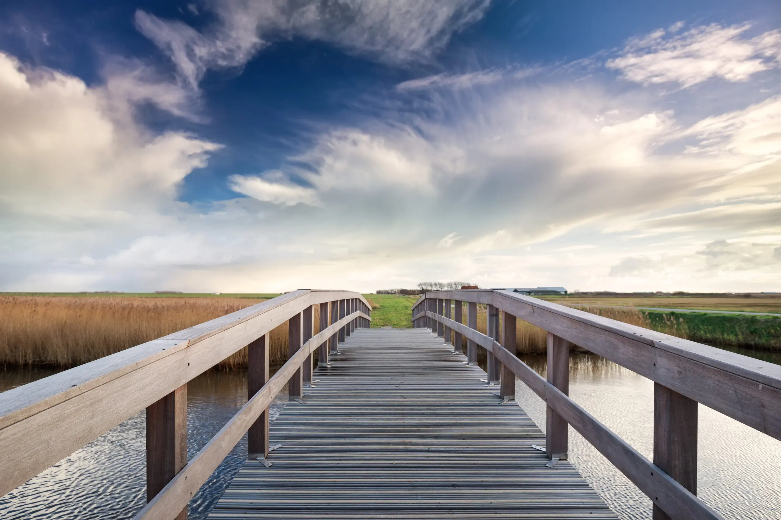 Wooden bridge spanning across a river